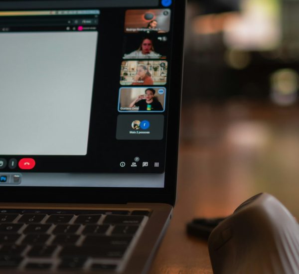 Built to Blog Review: Course Features, Pricing, and Results 3 laptop screen showing a video conference with multiple participants remote team video meeting collaboration tools 1