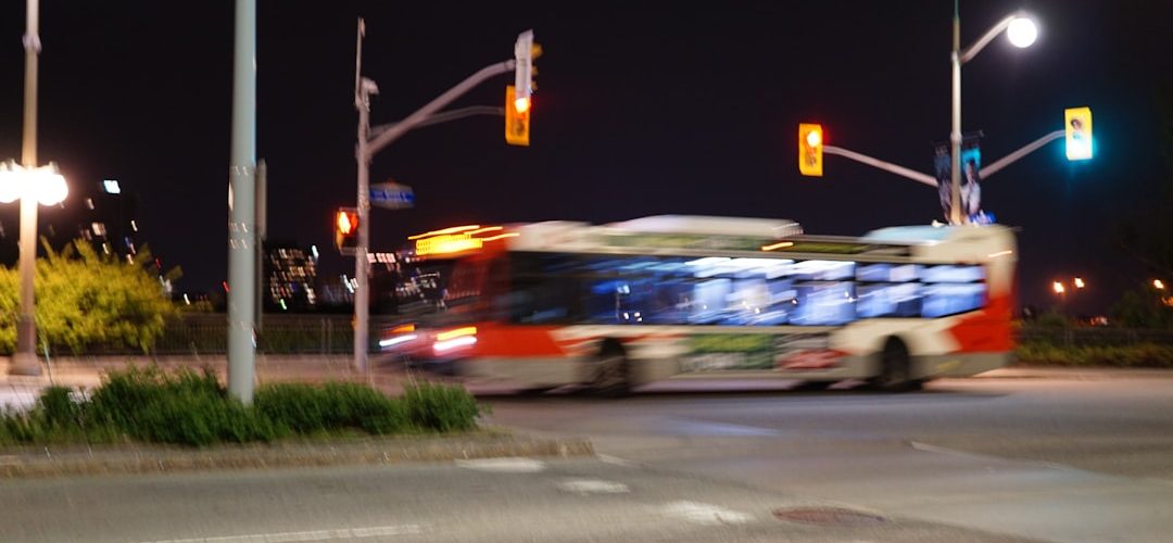 bus moving at night with traffic lights city bus traffic crash emergency response urban street