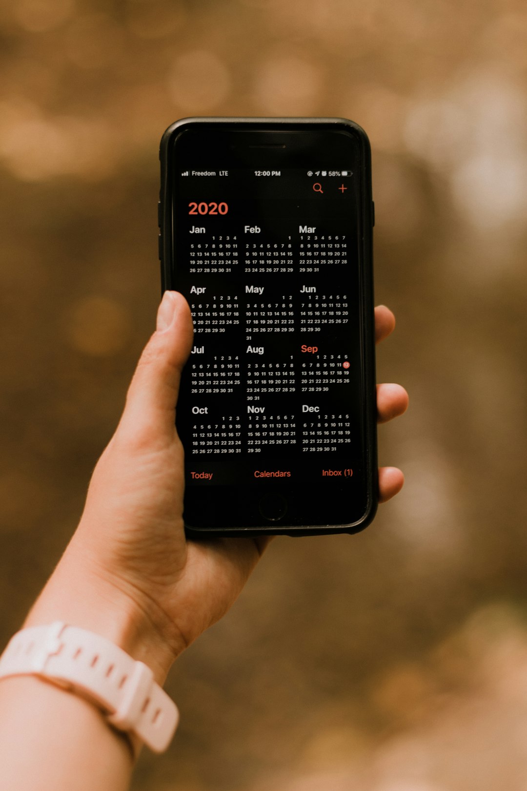 person holding black android smartphone business event calendar mobile