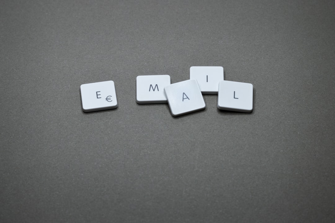 the word email is spelled out with letter tiles marketing automation workflow map email icons