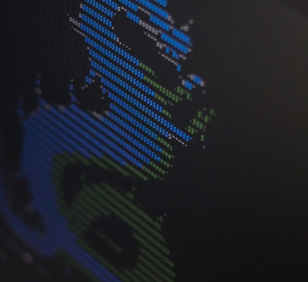 a close up of a computer screen with a blurry image of a person computer security shield icon on screen antivirus scan progress window clean desktop environment
