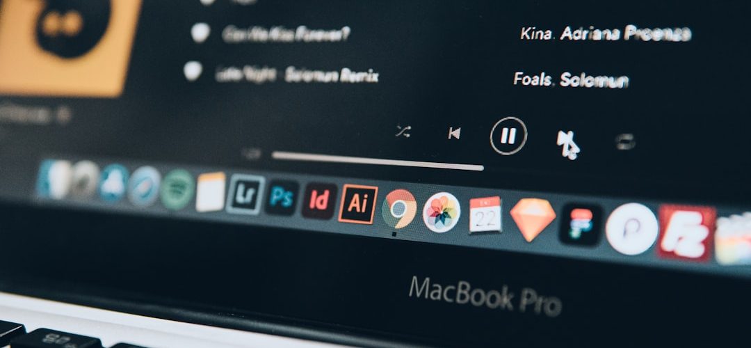 a close up of a keyboard and a computer monitor mac system settings screen sound settings menu macbook display
