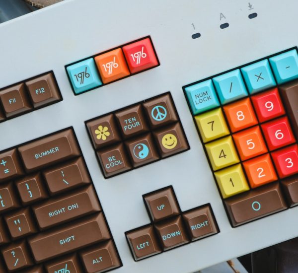 ChatGPT, Gemini, and Claude Prompting Guide: How to Write AI Prompts That Generate Better Content Faster 8 a close up of a keyboard with a keyboard key board robot typing prompt box colorful interface