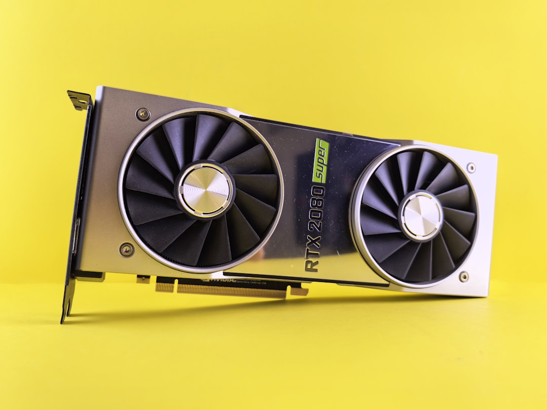 a close up of a video card on a yellow background graphics card driver update computer settings