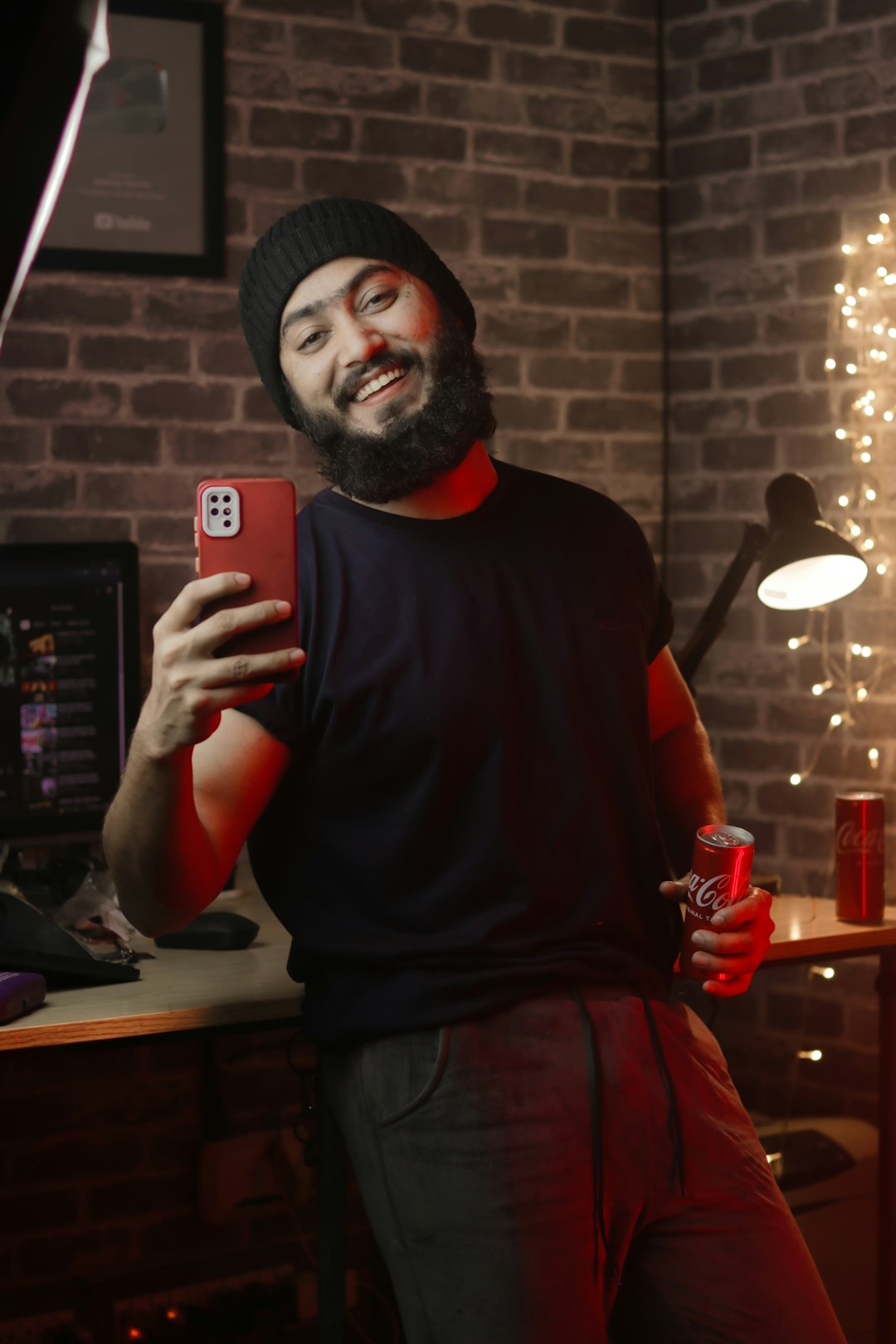 a man taking a selfie with his cell phone mobile creator face swap reels editing smartphone video