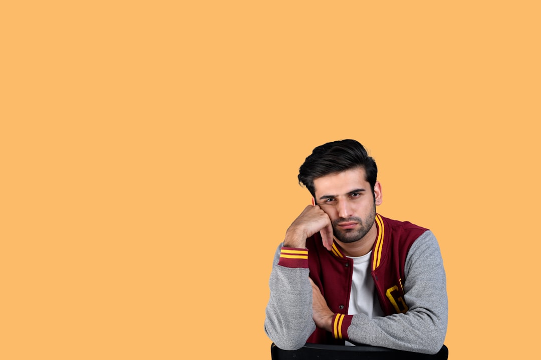 a man with his hand on his face confused person floating numbers online slang 1