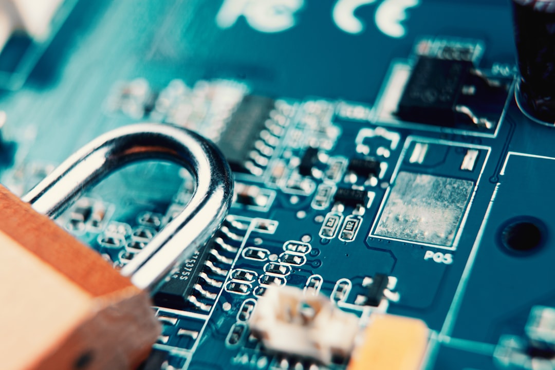 a padlock on top of a circuit board data security encrypted systems governance compliance