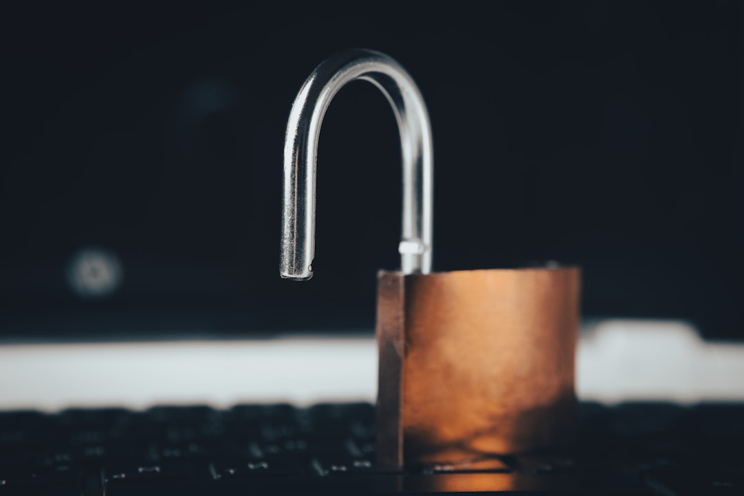 a padlock on top of a laptop computer online privacy secure browsing password safety social media tools