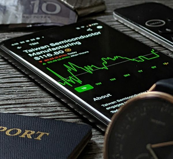 High-Yield Savings Account vs Money Market Account: Which Option Earns More in 2026? 9 a passport cell phone watch and wallet on a table savings account money market interest rate banking app