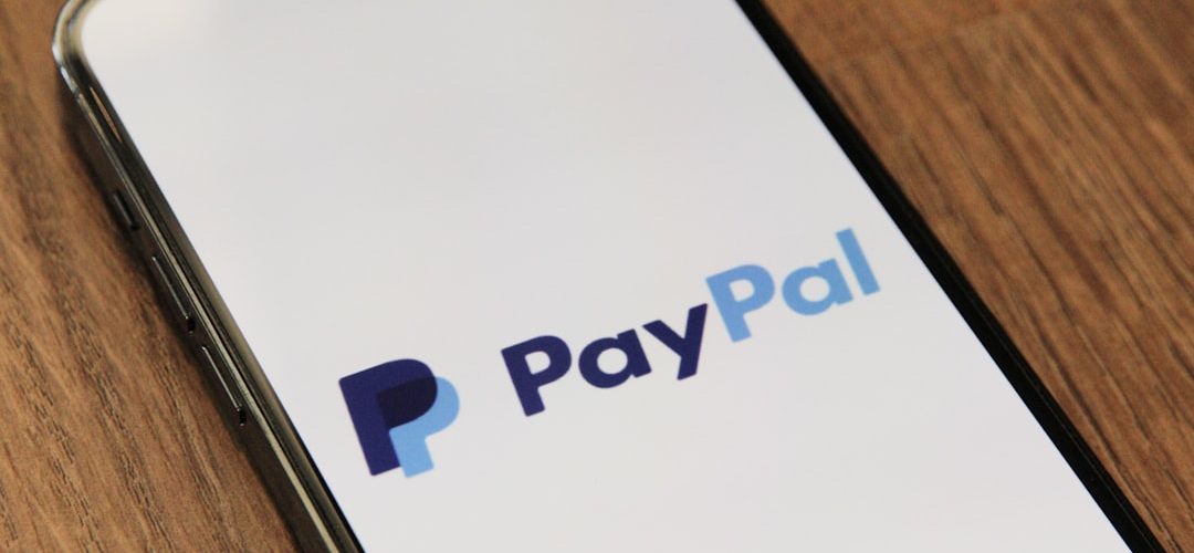a phone with a pay pay logo on it mobile payment cash balance account closure