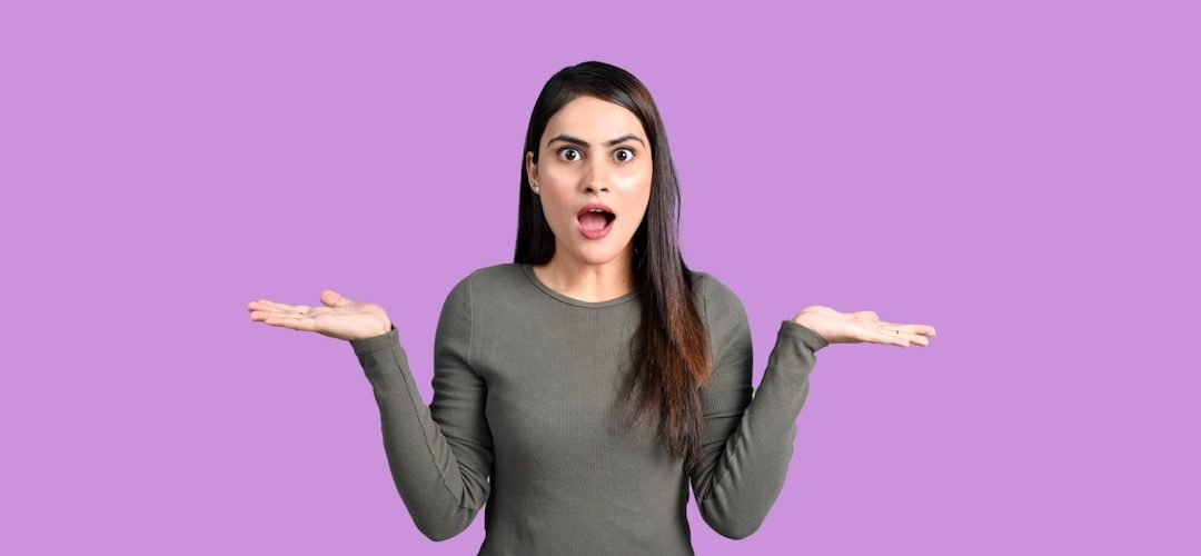 a woman with her mouth open confused person floating numbers online slang