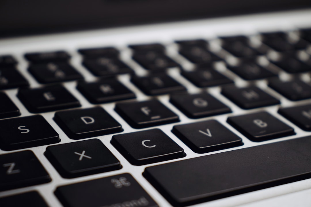 black and silver laptop computer laptop reboot bios menu keyboard keys