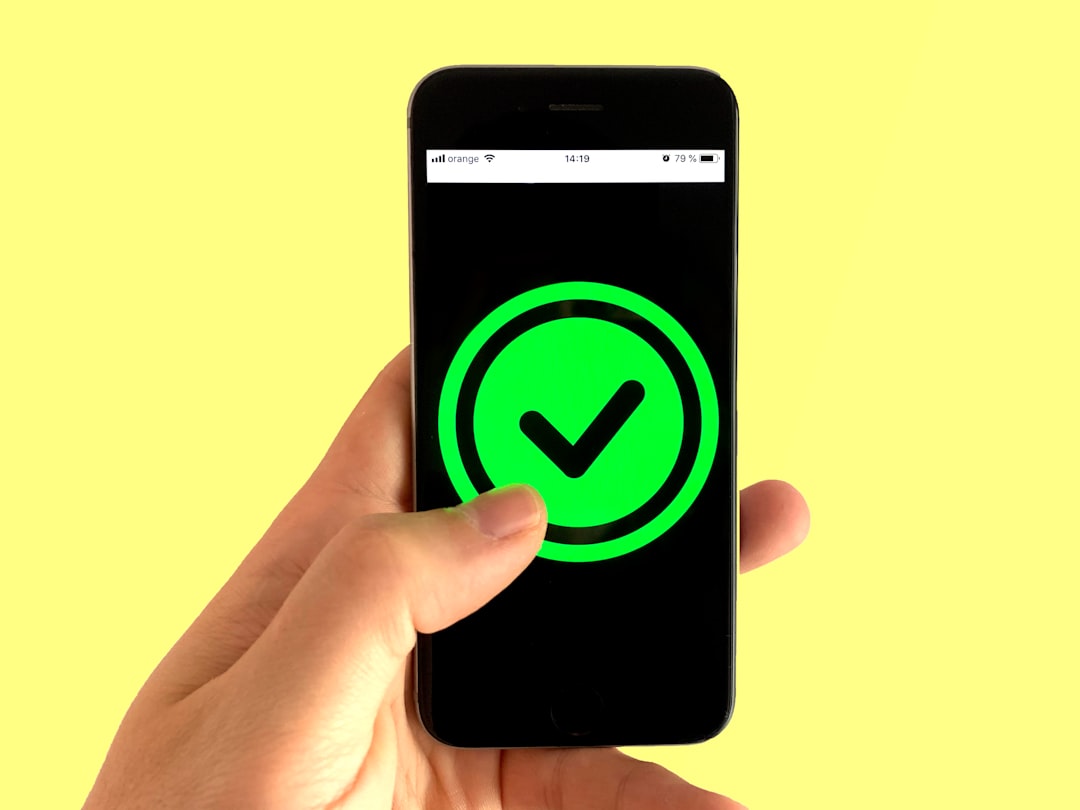 black android smartphone displaying green and black logo secure login flow mobile authentication user verification