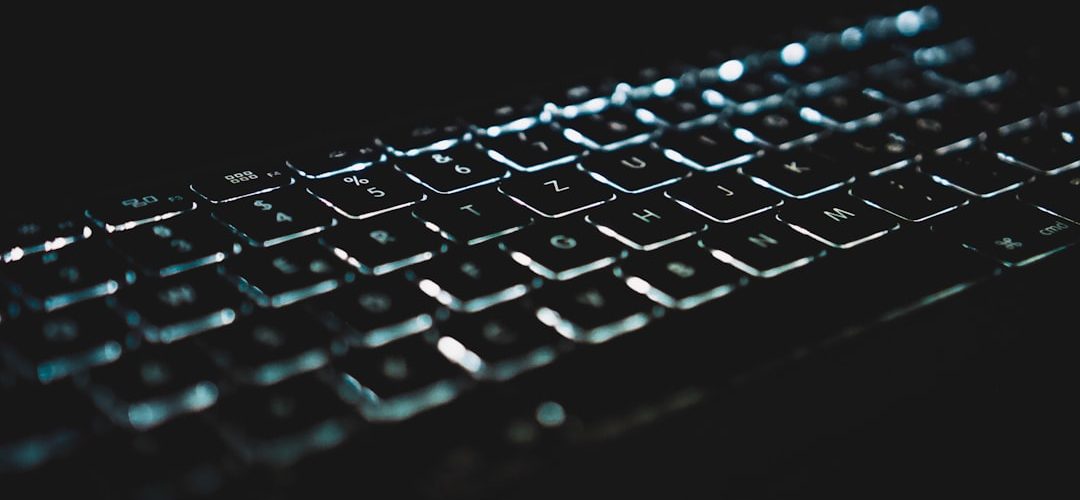 black computer keyboard on black surface laptop reboot bios menu keyboard keys