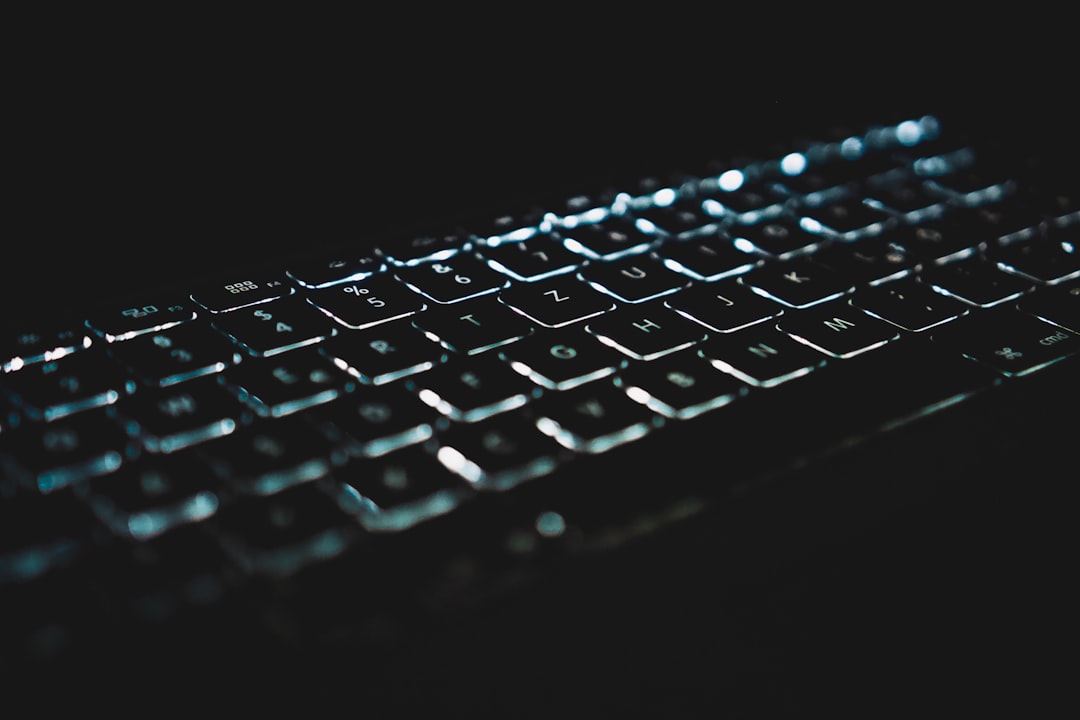 black computer keyboard on black surface laptop reboot bios menu keyboard keys