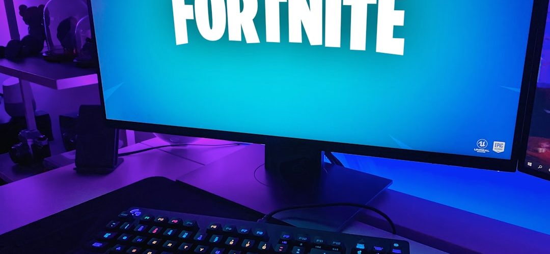 black flat screen computer monitor with black computer keyboard fortnite server status gaming dashboard outage alert