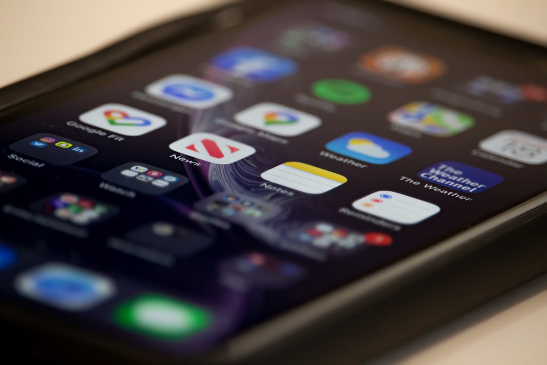 black ipad on white table phone screen app icons prevention tips