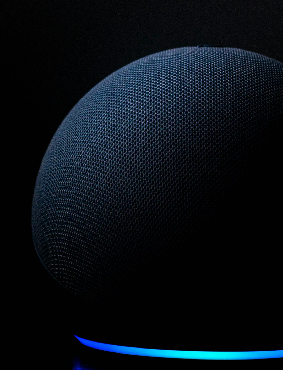 blue round textile on black background voice assistant realtime conversation artificial intelligence