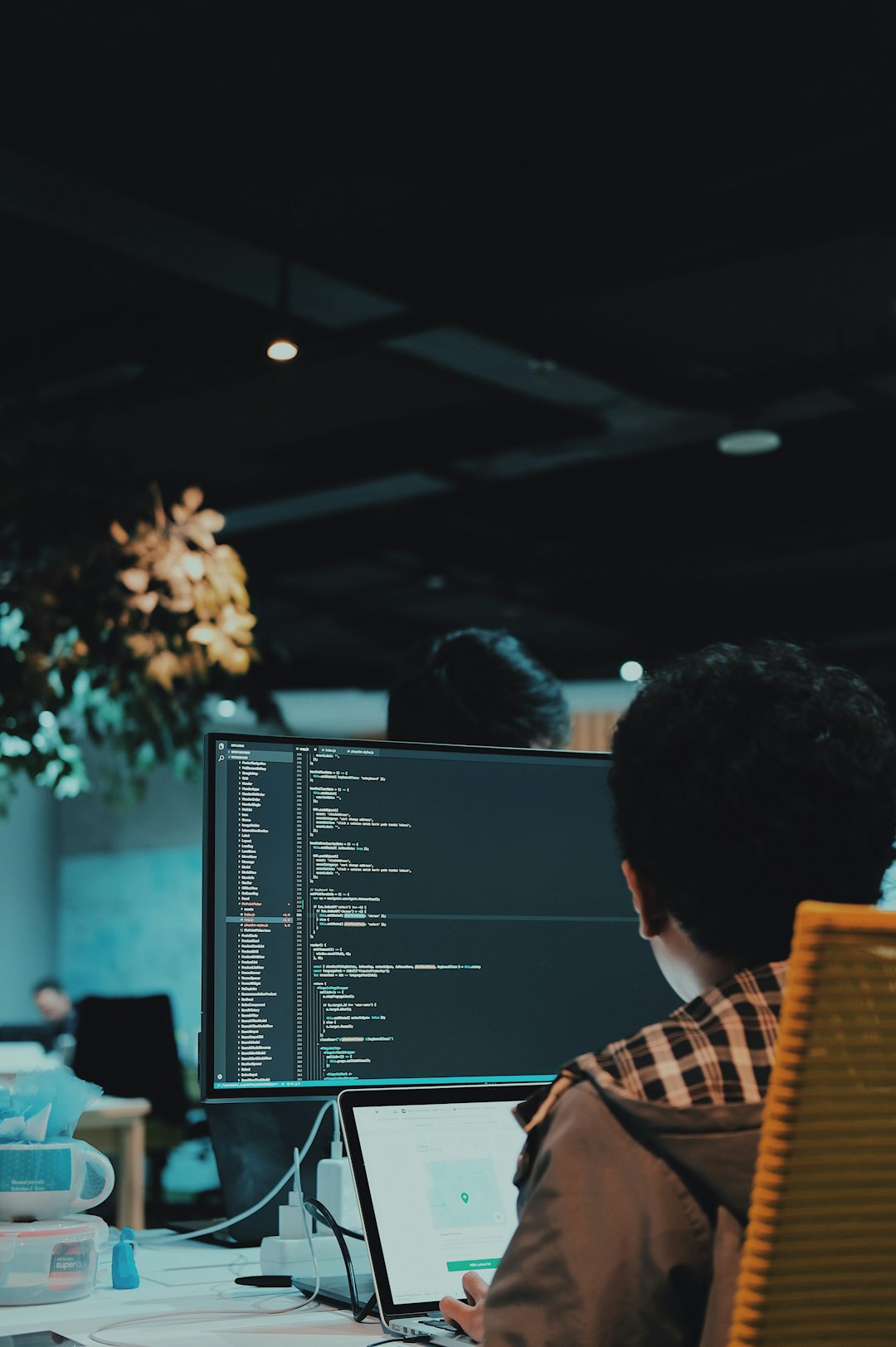 boy in front of computer monitor software development tools code editor screen project architecture diagram 1