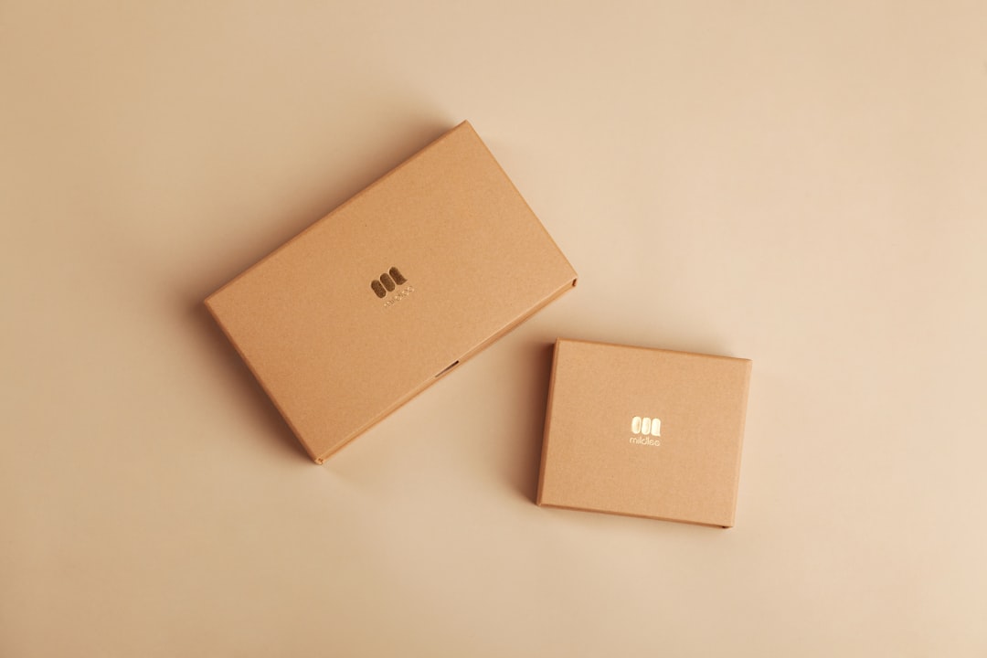 brown cardboard box on white table premium laptop packaging clean box