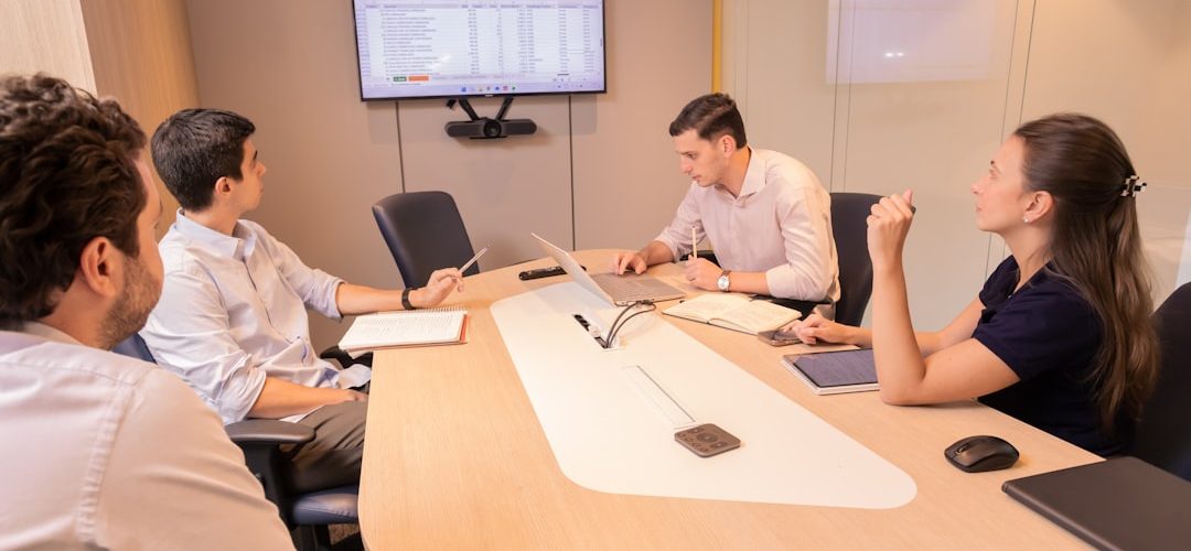 business meeting with people around a conference table bored meeting sales team conference room workplace meme