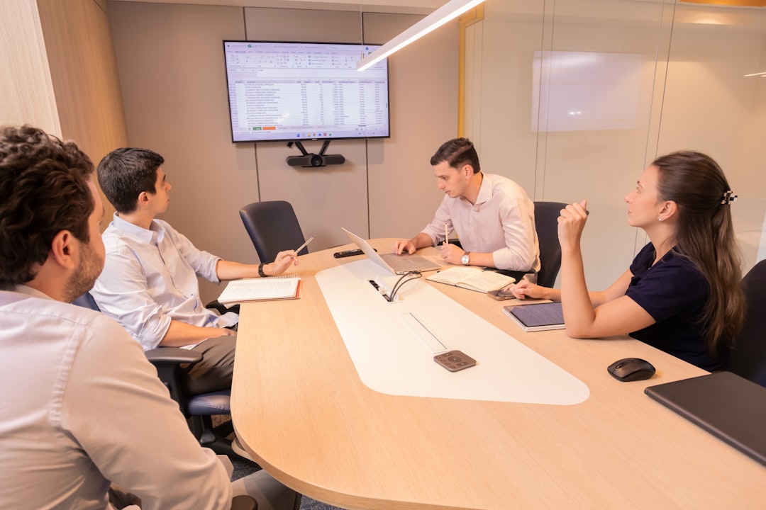 business meeting with people around a conference table bored meeting sales team conference room workplace meme