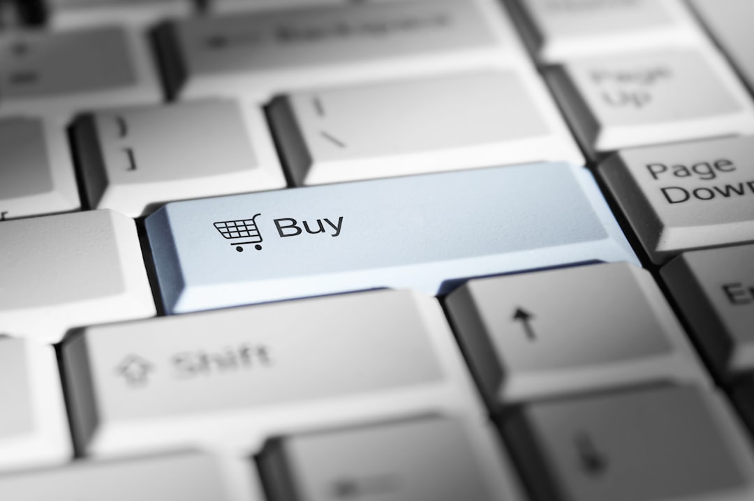 close up of a keyboard with a prominent buy button ecommerce products clean background online store