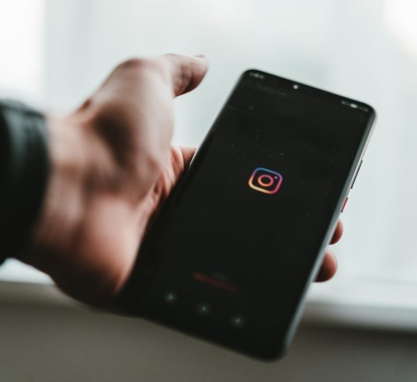 How Can You Use a TikTok Story Viewer to Watch Stories Easily? 4 person holding black android smartphone instagram stories mobile screen social media viewer