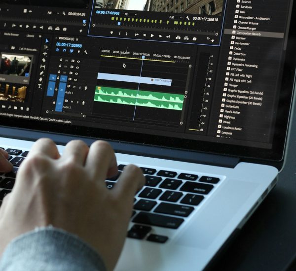 Top 3 Video Splitter Tools Better Than Kapwing For Fast Video Editing 8 person using macbook pro turned on video editing timeline split clips fast workflow