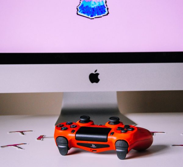 Is Fortnite Cross-Platform? A Complete Guide 9 playstation 4 controller on white table fortnite players different devices gaming party