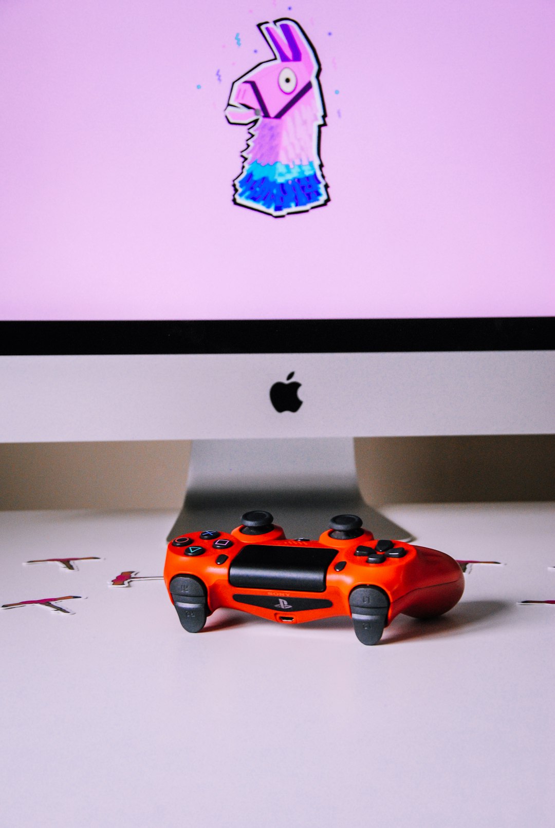 playstation 4 controller on white table fortnite players different devices gaming party