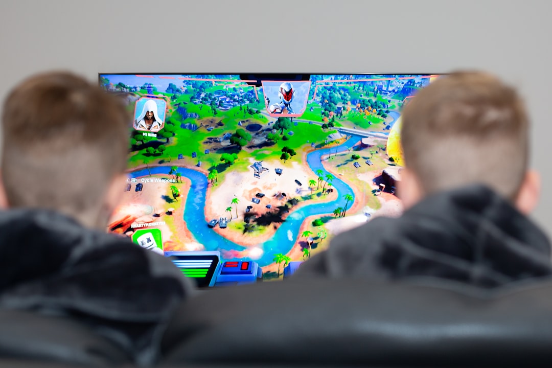 two boys are playing a video game on the television fortnite server status gaming dashboard outage alert