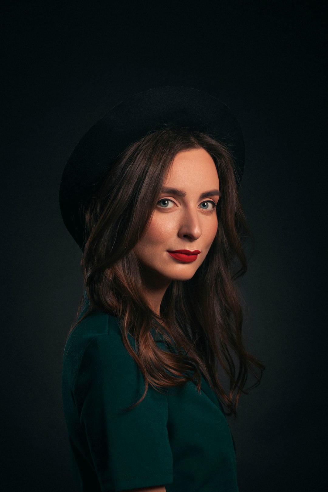 woman in black hat and green shirt portrait cutout transparent background social media profile hair detail