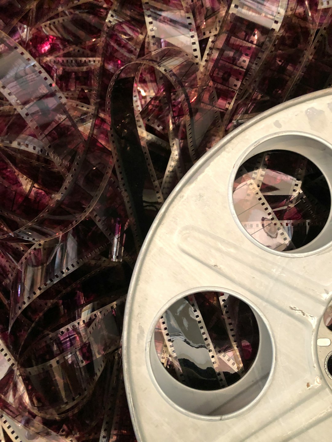 a close up of a machine copyright movie reel legal papers judge gavel