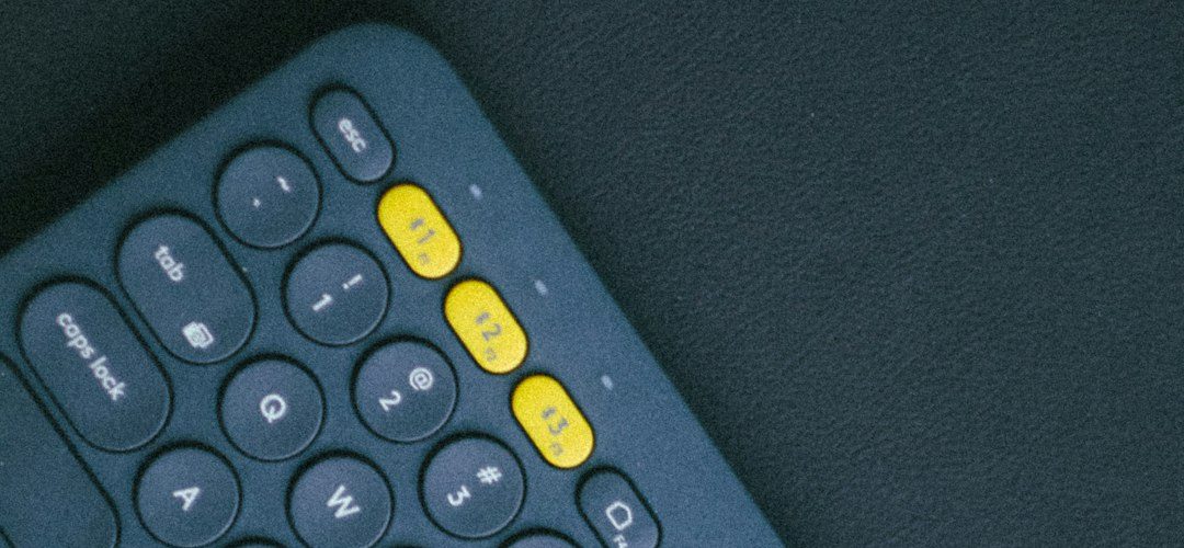 a close up of a remote control on a table gaming setup windows on mac controller