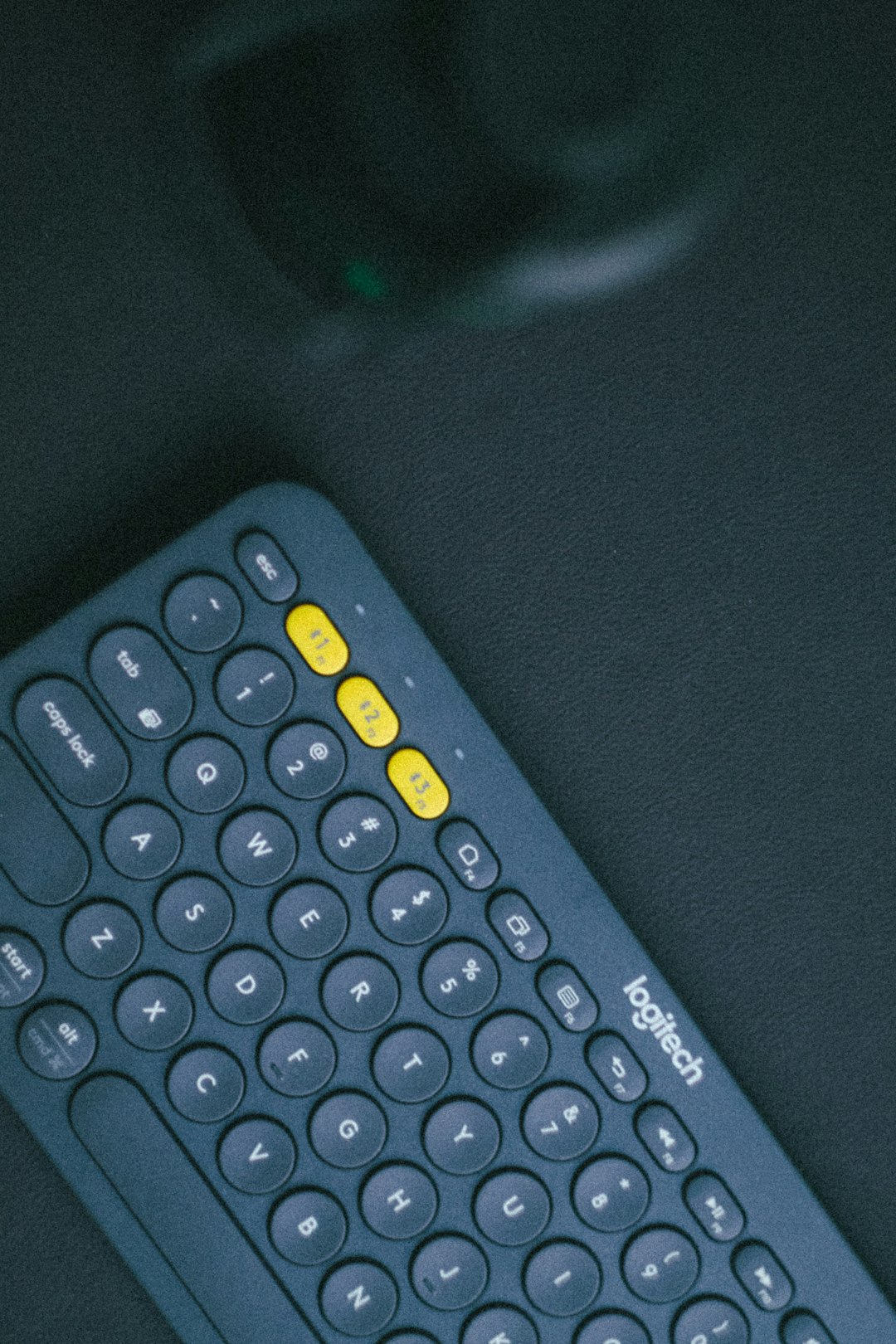 a close up of a remote control on a table gaming setup windows on mac controller