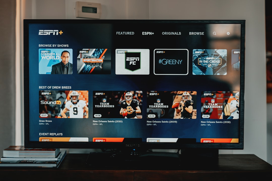 a flat screen tv sitting on top of a wooden table modern streaming smart tv film selection