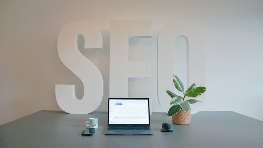 a laptop computer sitting on top of a desk seo analytics website traffic keyword research
