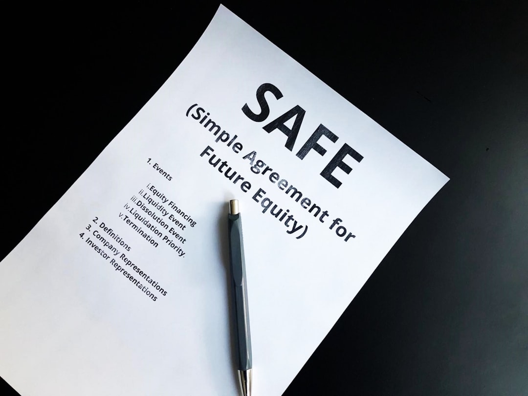 a pen sitting on top of a piece of paper real estate compliance checklist contracts professional review