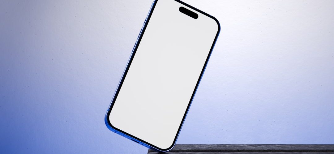 a phone appears to be falling off a ledge iphone color samples blue metal finish titanium texture design studio
