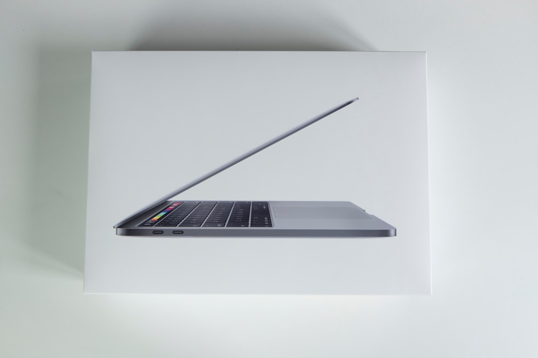 black and silver laptop computer premium laptop packaging clean box