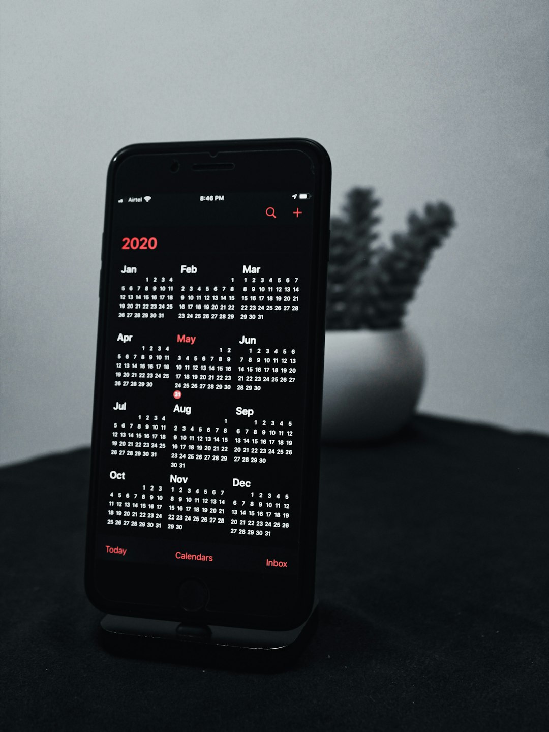 black and white remote control calendar deadline clock content schedule