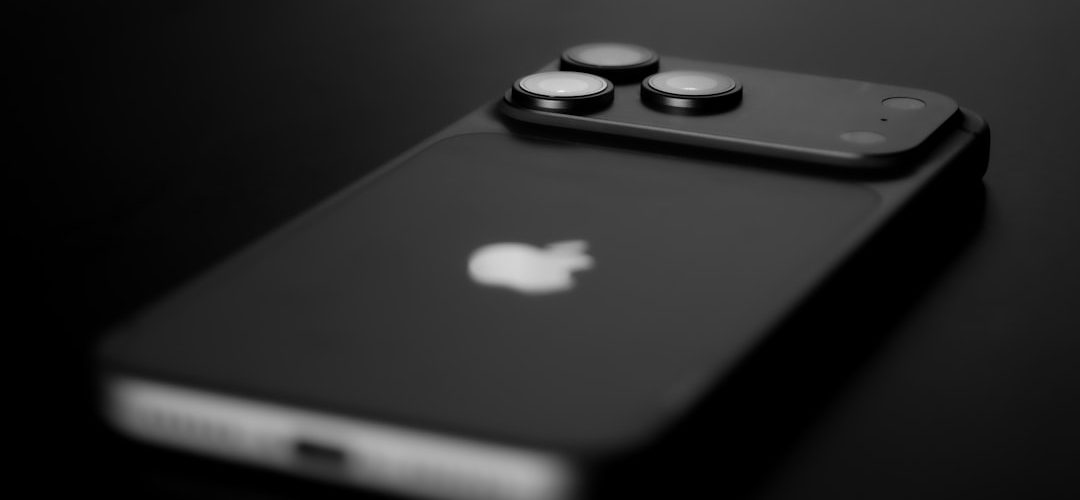 black smartphone with three camera lenses on back blue iphone concept premium smartphone glossy titanium dark background
