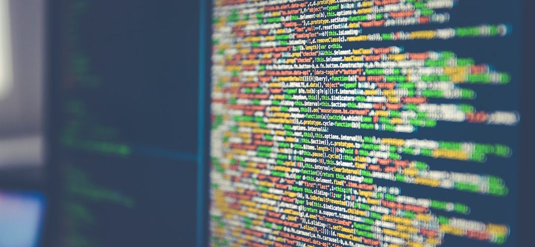 colorful software or web code on a computer monitor server dashboard code deployment application monitoring