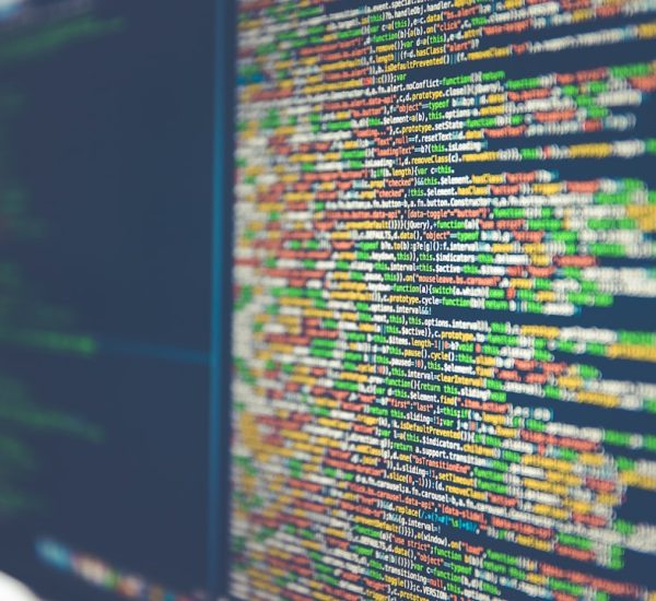 Dribber Review: Features, Pricing, and Alternatives 8 colorful software or web code on a computer monitor server dashboard code deployment application monitoring
