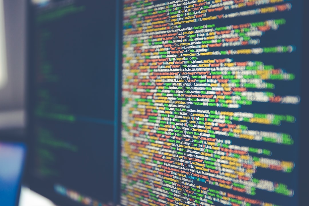 colorful software or web code on a computer monitor server dashboard code deployment application monitoring