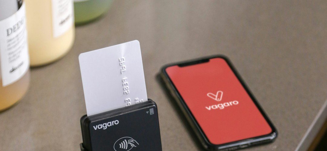 credit card reader and smartphone on counter mobile shop point of sale smartphones retail counter