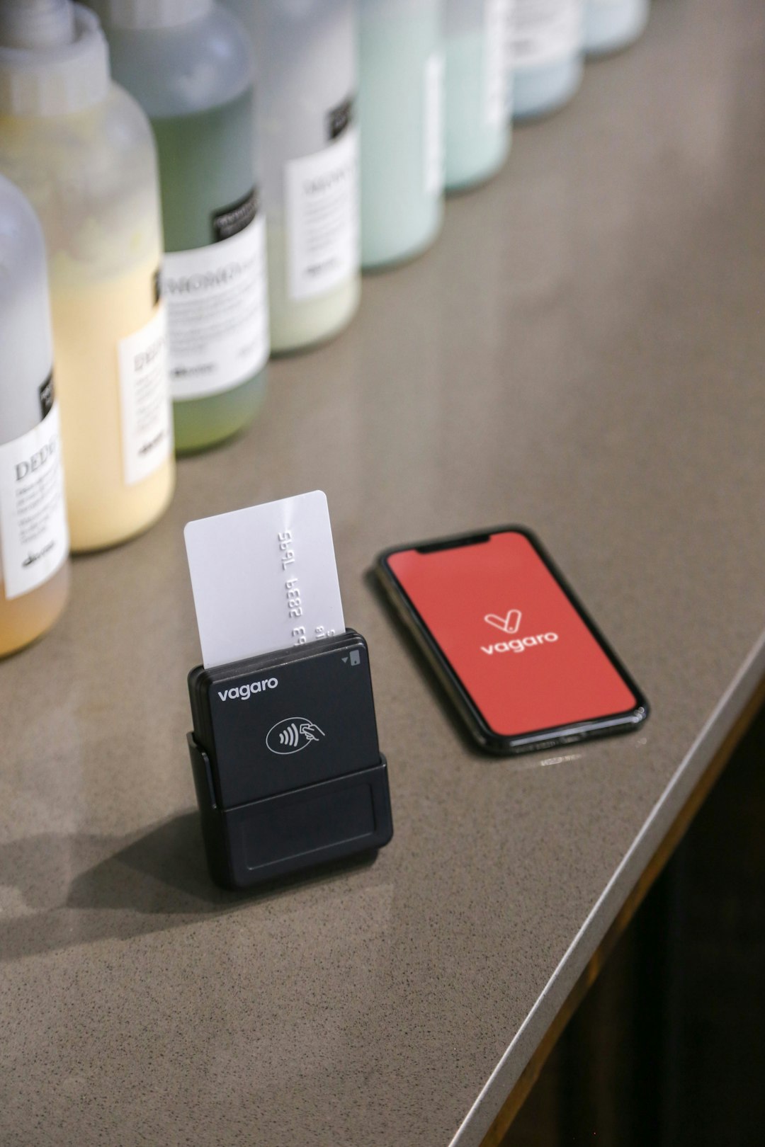 credit card reader and smartphone on counter mobile shop point of sale smartphones retail counter