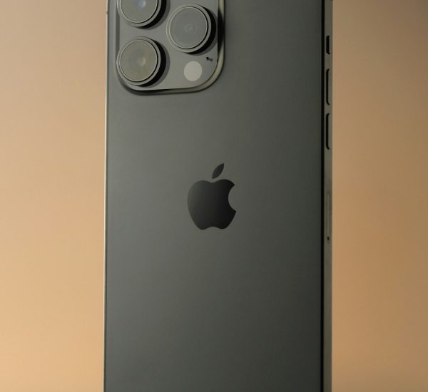 How Can I Become a Stylist? Career Path, Skills, Training and Salary Guide 9 dark gray iphone 14 pro with camera array apple flagship phones blue pro max smartphone lineup studio lighting