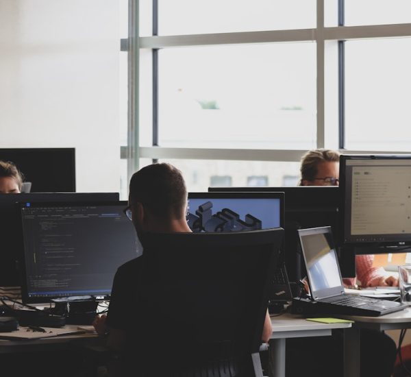 Hunter.io Alternatives Compared: Email Prospecting Tools for Sales Teams 2 people sitting on chair in front of computer monitor business software dashboard client management team workflow